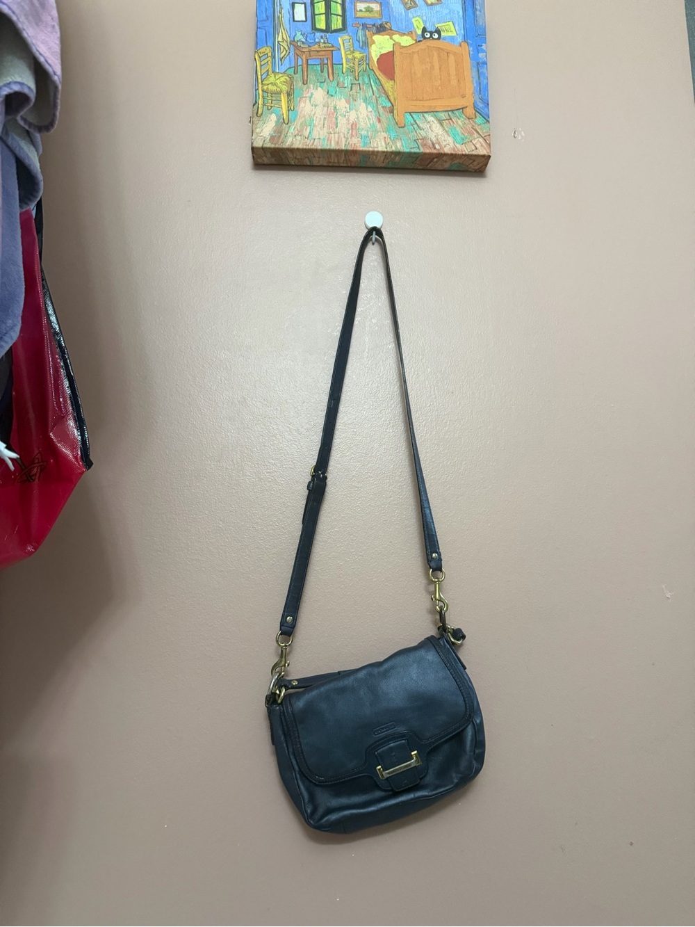 Coach Taylor leather flap handbag in Navy.
